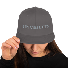 Load image into Gallery viewer, Unveiled Silver Font Snapback Hat
